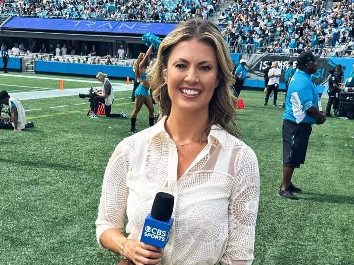 Amanda Balionis Stuns in Chic White and Brown Outfit at Titans vs Texans NFL Game