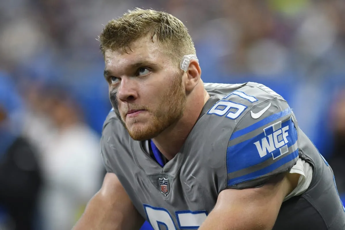 Detroit Lions' Aidan Hutchinson Warms Hearts with Christmas Hospital Visit, Eyes Comeback for NFL Playoffs