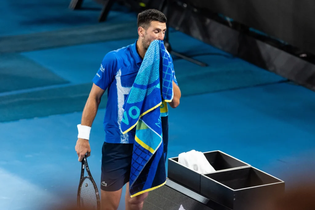 Shock at the Australian Open: Novak Djokovic Injured, Paving Way for Epic Final Between Zverev and Sinner