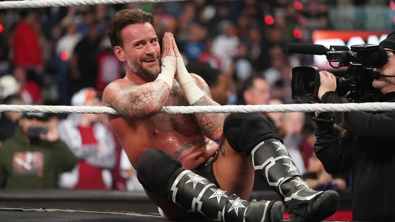 WWE Shocker: CM Punk Cheers On Seth Rollins Against Drew McIntyre at Elimination Chamber